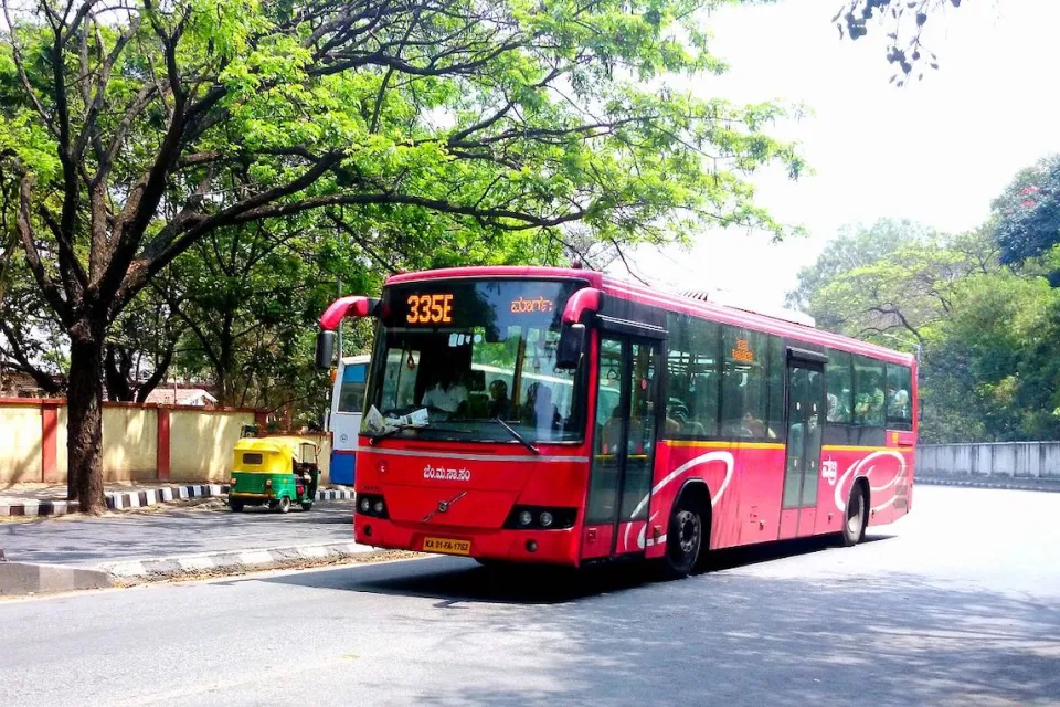 Red public transit bus in Bangalore, India.